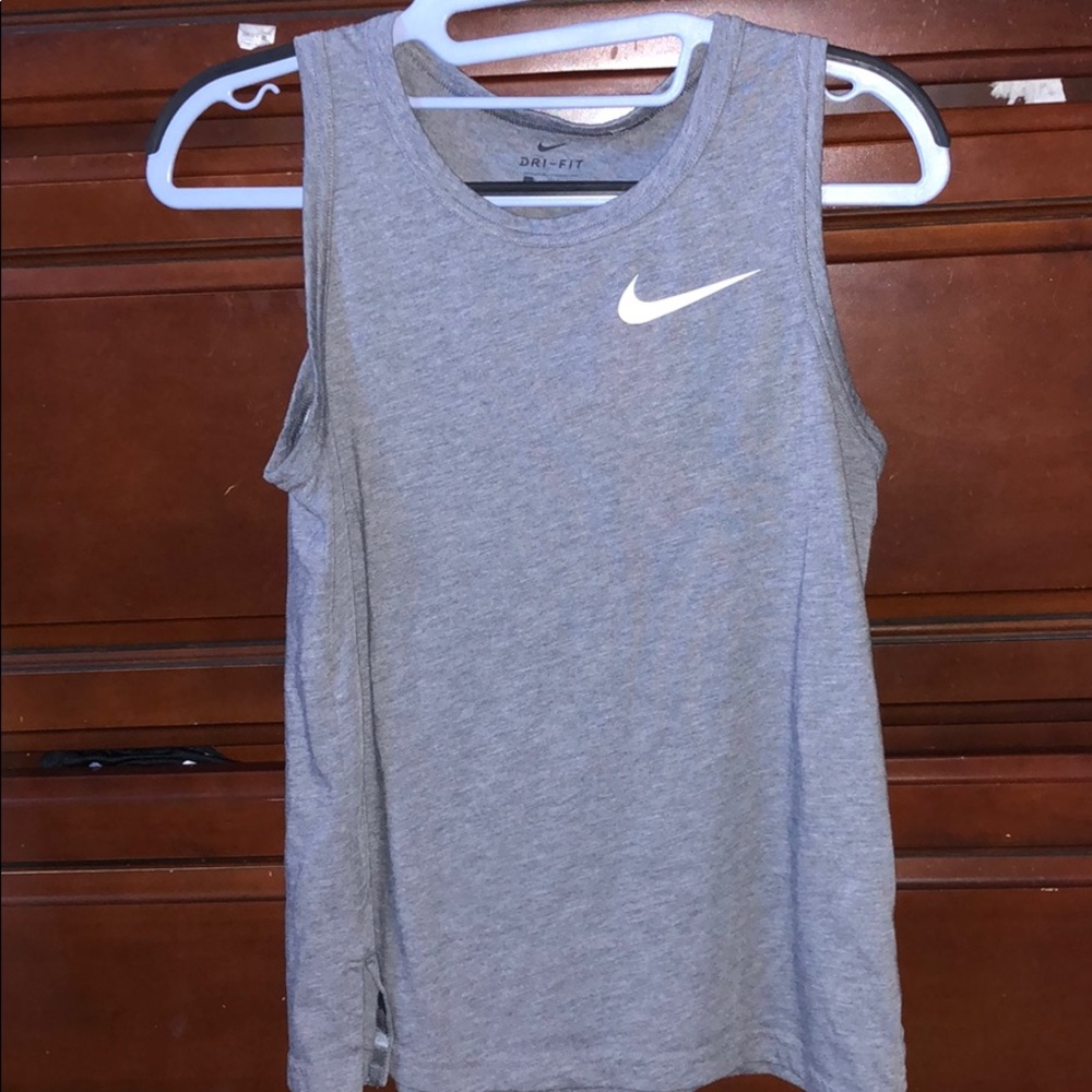 Nike top size L runs small